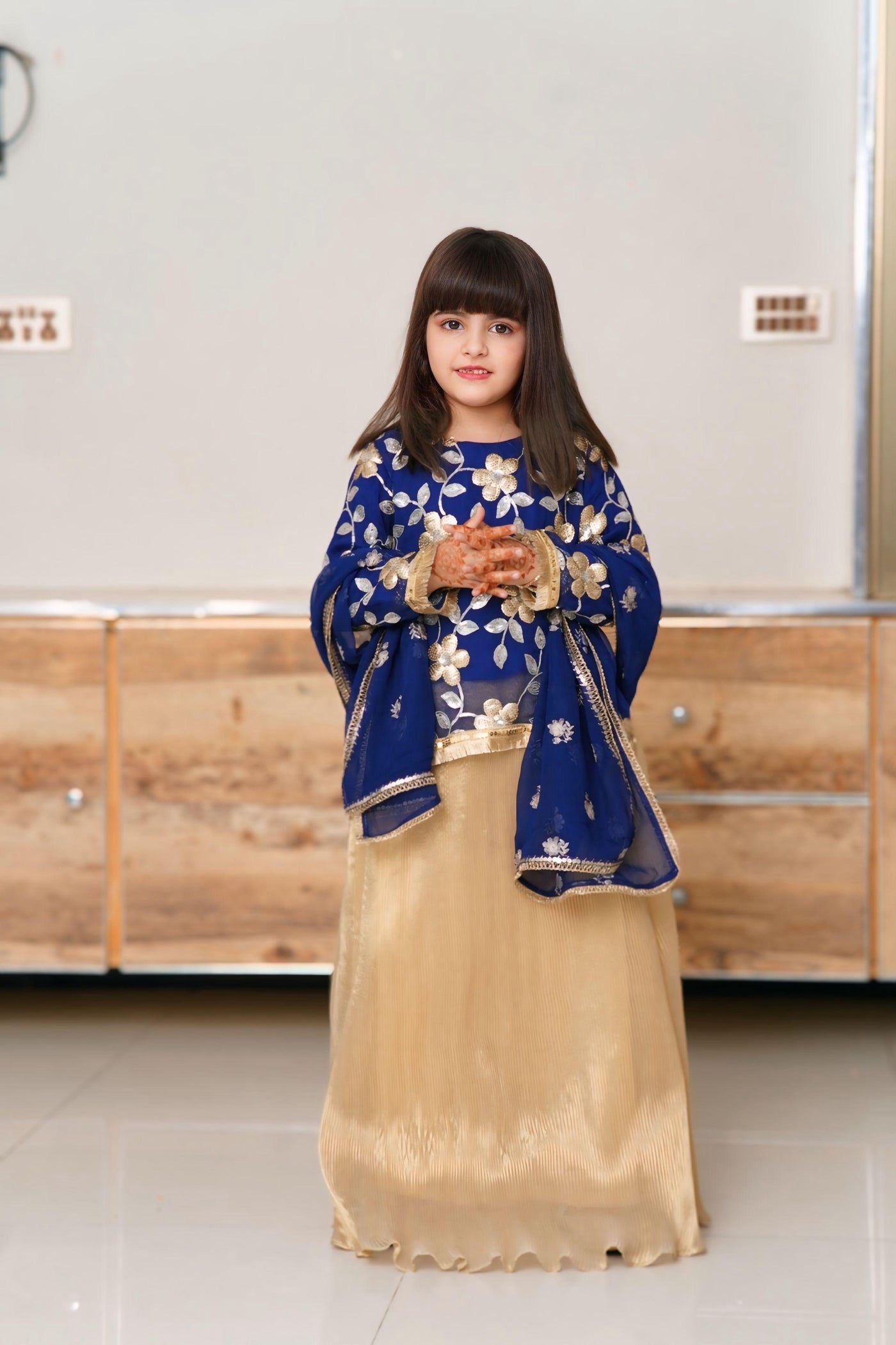Elegant Blue and Golden Dress